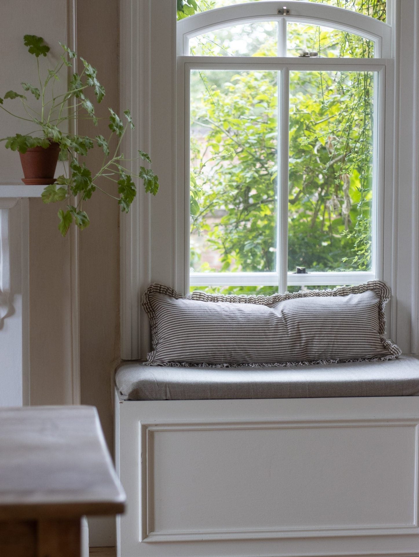 How to decorate a window seat
