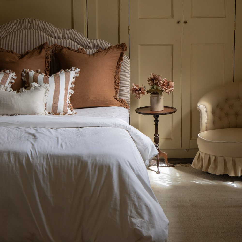 Hallie Rust Ruffle Linen Cushion 65x65cm