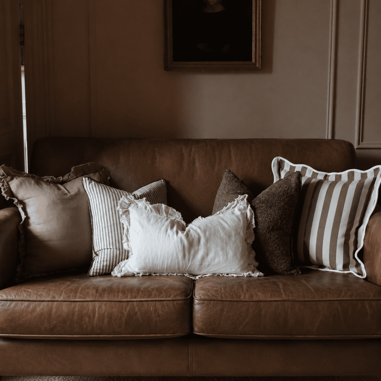what cushions go with a brown leather sofa?